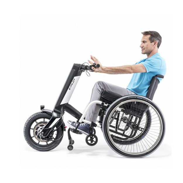 Fauteuil roulant manuel transformé électrique A.C.M.T.O Orthopédie